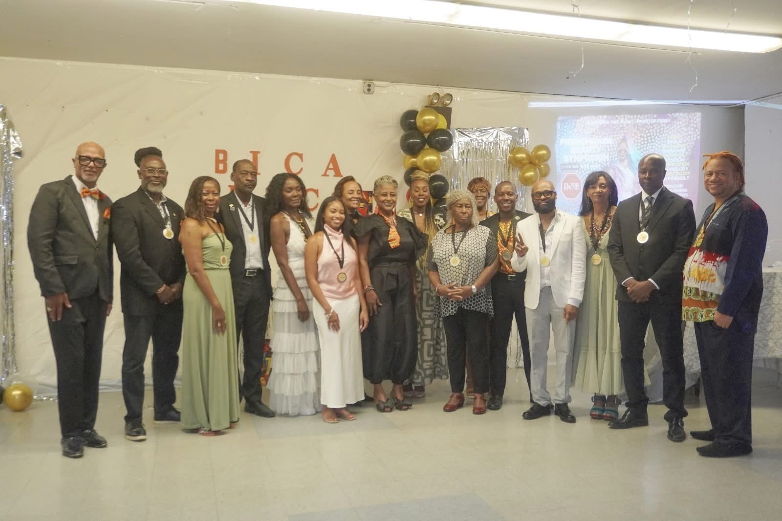 BICA honorees and community leaders posing together after an awards celebration.